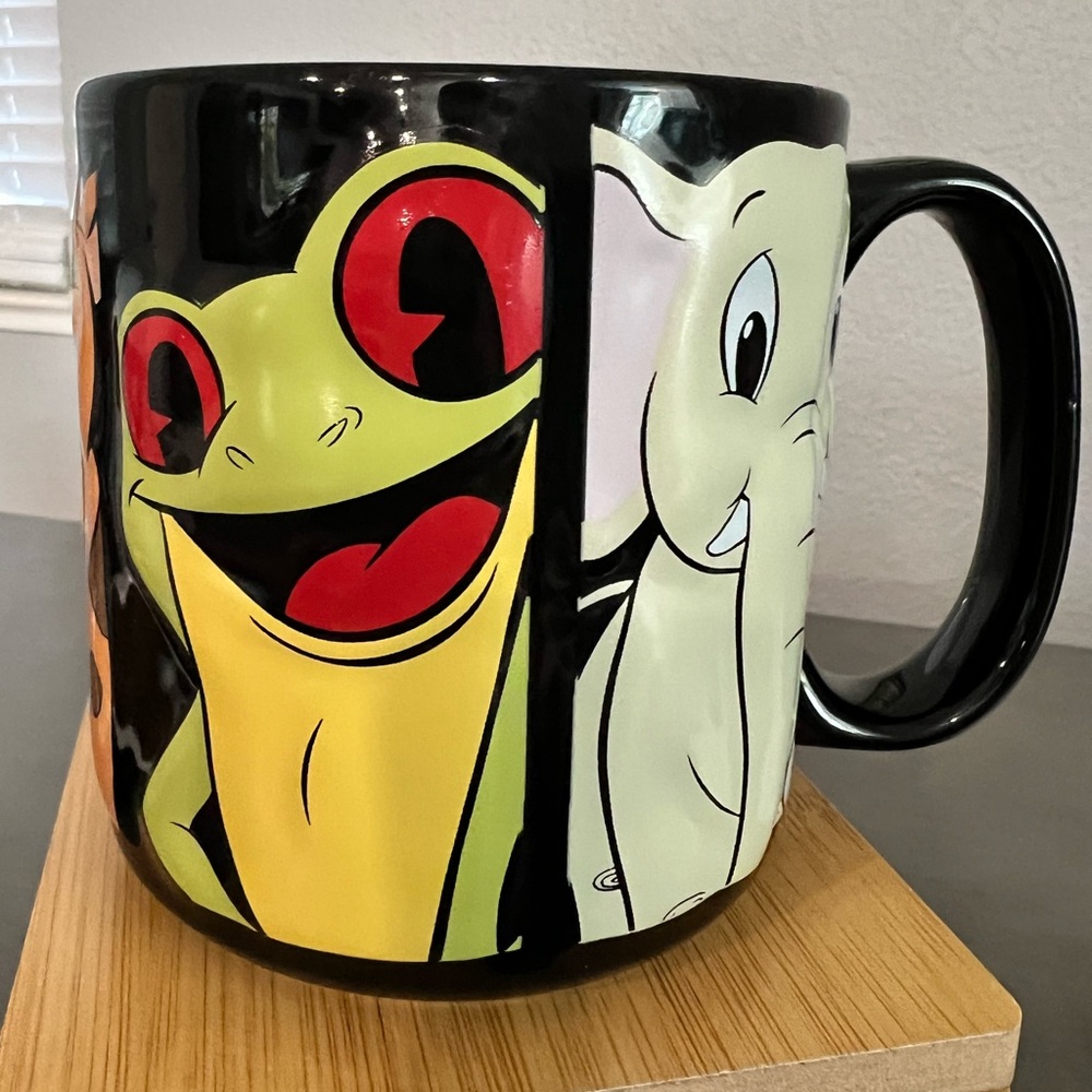 Rainforest Cafe mug with raised designs